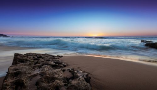 ocean waves beach sand stone