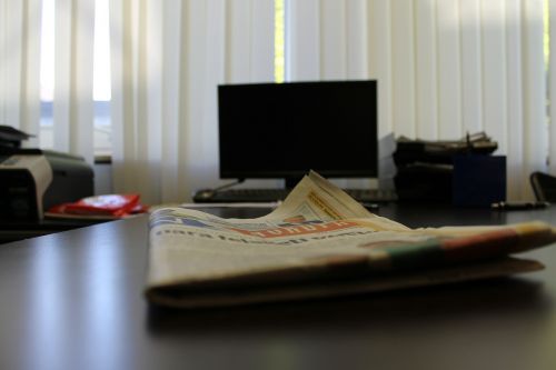 office desk newspaper