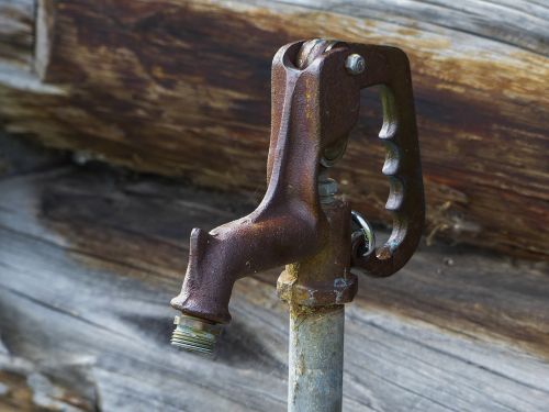 old rusty water pump