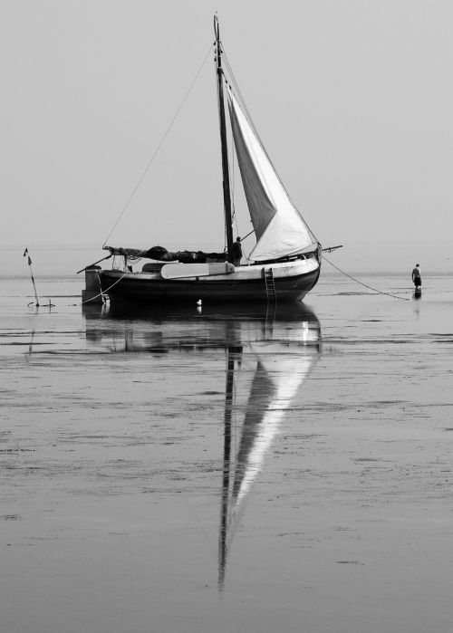 old boat sea refelection