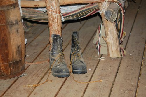 old boots worn out cabin