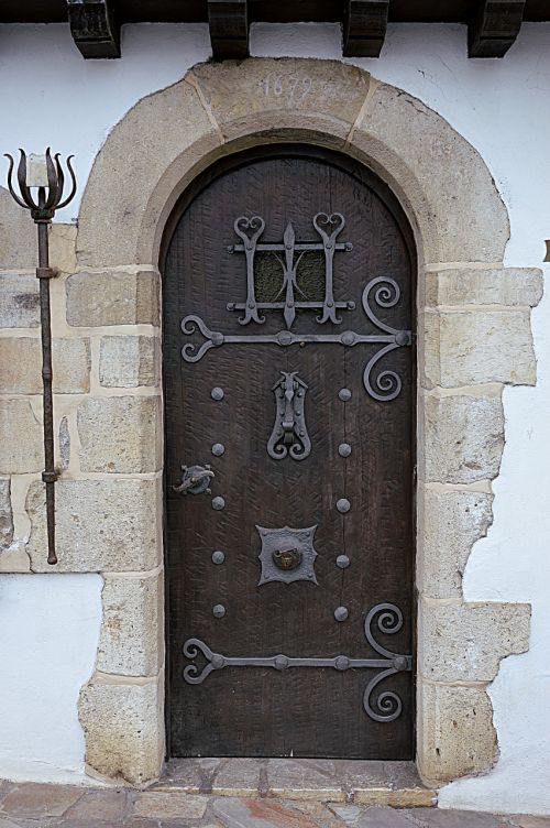old door wrought iron entry