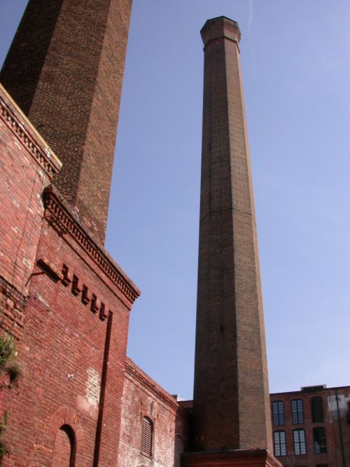 old factory smokestack brick tower