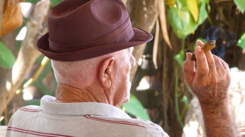 old man smoking cigar