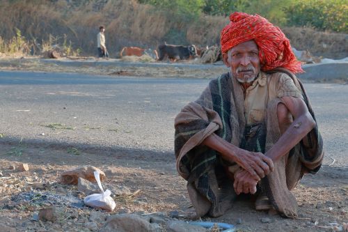 old man roadside herder