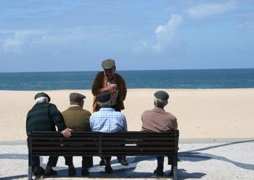old men group of people seaside