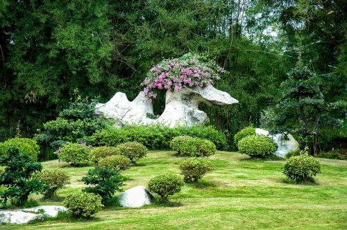 old stone bird shape flowers