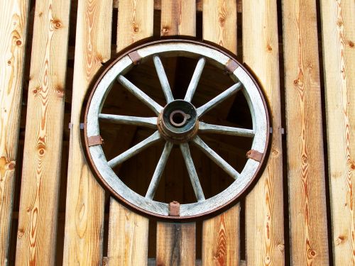 old wagon wheel horse-drawn carriage wheel wood