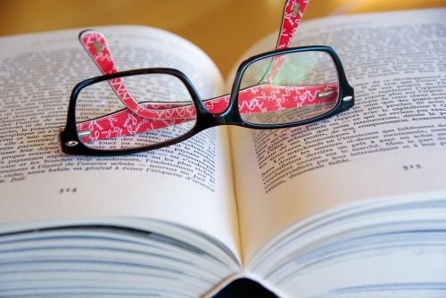 open book reading sunglasses