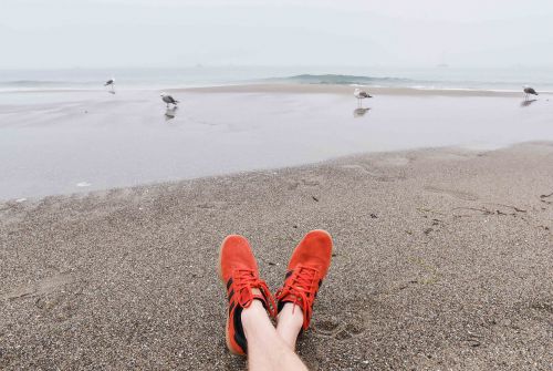 orange shoes beach