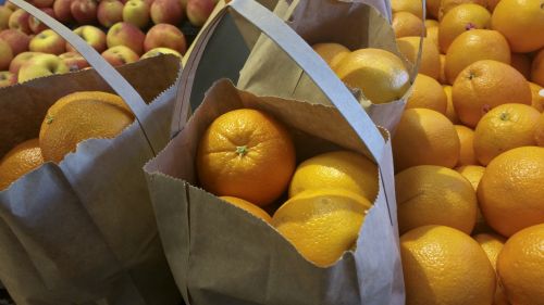 Oranges In Brown Bag