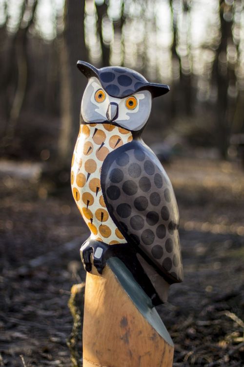 owl statue autumn painted