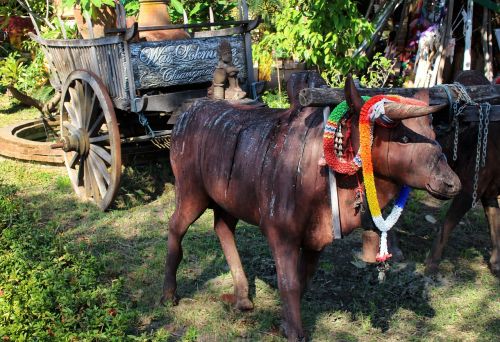 ox cart sculpture scene