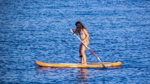 paddling paddle board girl