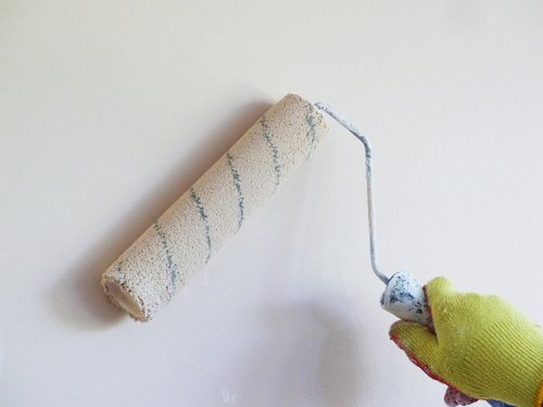 painting  white wall  paint roller