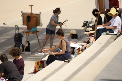 painting class  women  outdoors