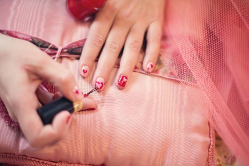 painting fingernails nail polish hearts