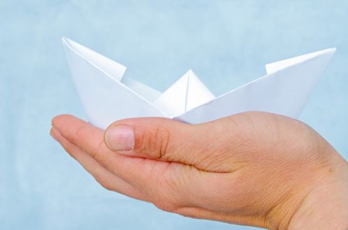 Paper Boat On The Palm