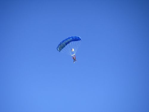 parachutist blue sky