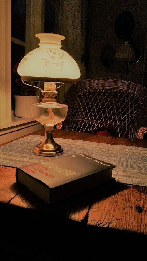 paraffin lamp book reading