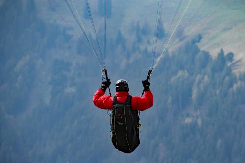 paraglider mountains fly