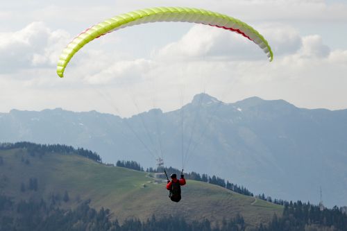 paraglider mountains fly