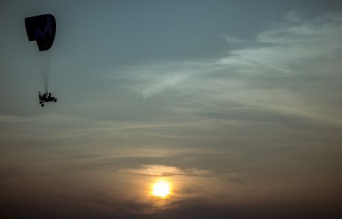 paraglider sky sun