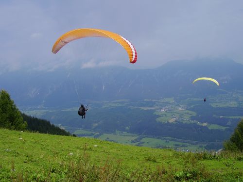 paraglider carinthia meadow