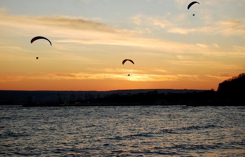paraglider  paragliders  sunset