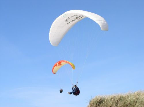paraglider dune sky