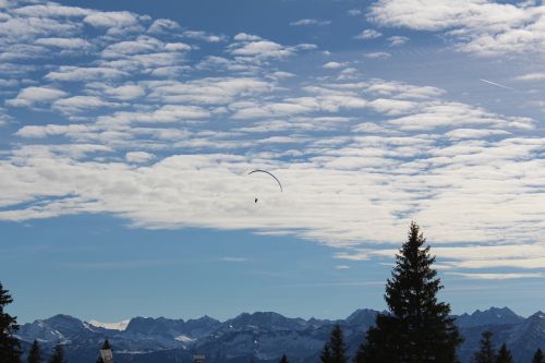 paraglider mountains fly
