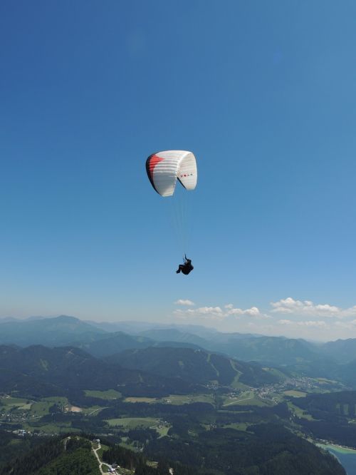 paragliding mountains fly