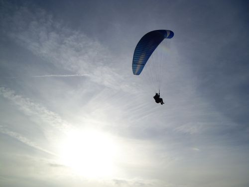 paragliding flying sunset