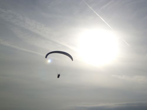 paragliding flying sunset