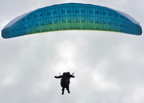 paragliding  paraglider  wing blue