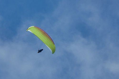 paragliding  sky  blue