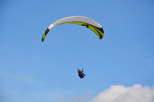 paragliding  free flight  green sail black