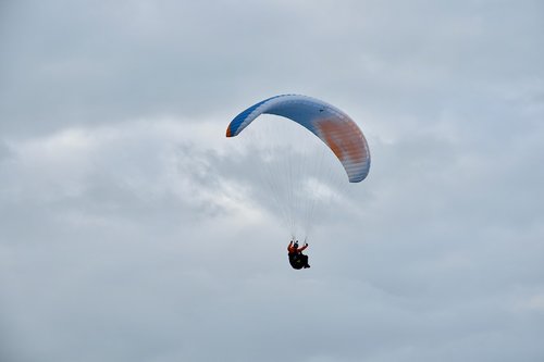 paragliding  paraglider  sailing wing
