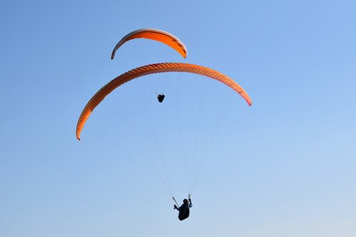 paragliding  paraglider  sails of paragliders