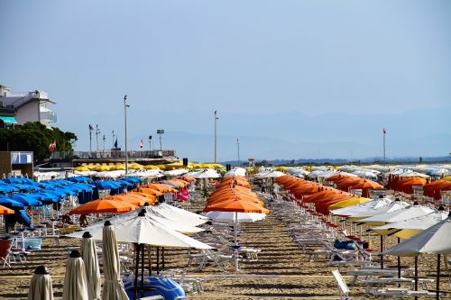 parasol sun loungers beach