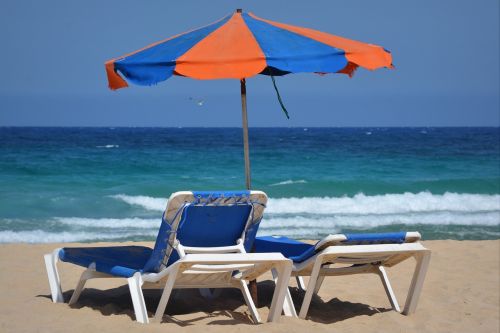 parasol sunbeds beach