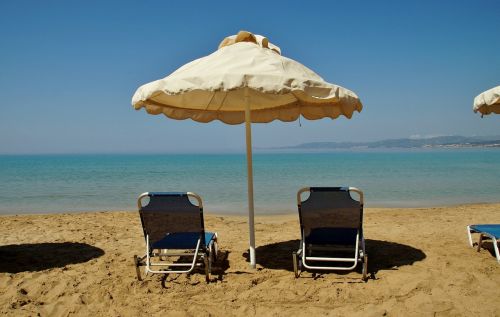 parasol sun lounger sea