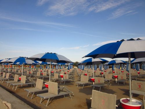 parasols sun loungers sand