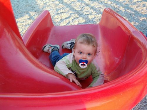 park slide toddler playing