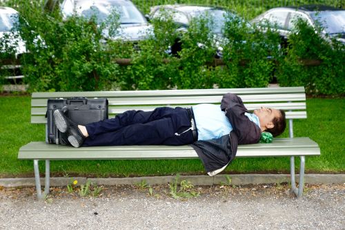 park bench business man sleep