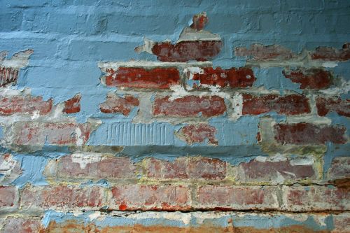 Partly Plastered Brick Wall
