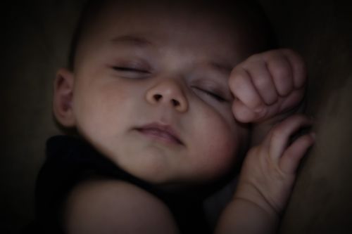 peace sleeping baby hands