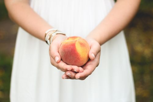 peach fruit hands