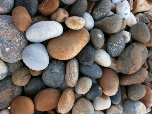 pebbles sea beach stones