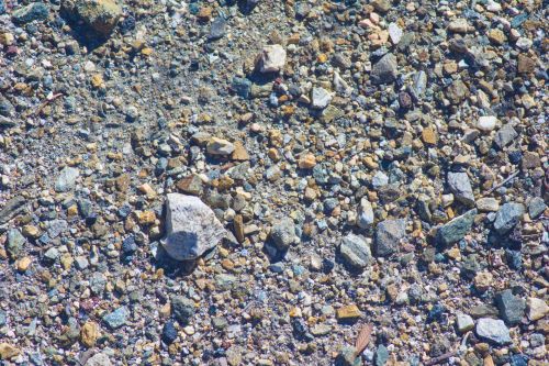 Pebbles On Rocky Ground